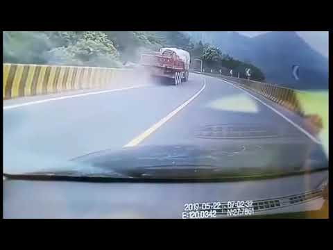 A Guy Jumps Into a Truck with No Driver and Stops It