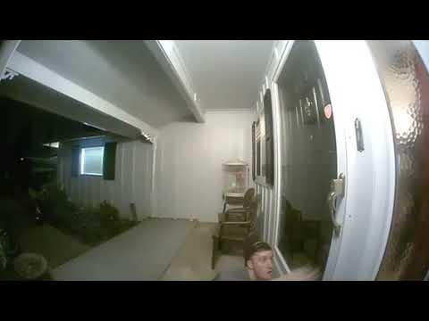 Video of a Guy Trying to Sneak Past the Front Door Security Cam